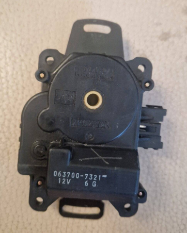 Двигун заслінки печі 7801A092 MITSUBISHI