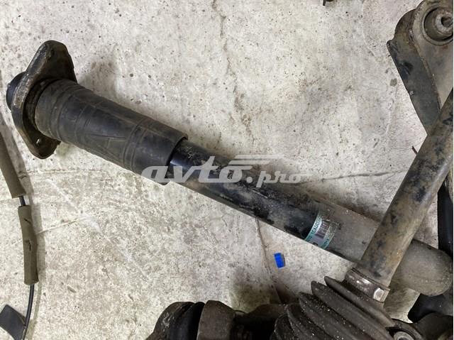 Амортизатор передньої підвіски 562101CA0C NISSAN