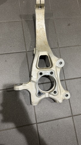 Кулак поворотний передній лівий KJK333030 MAZDA