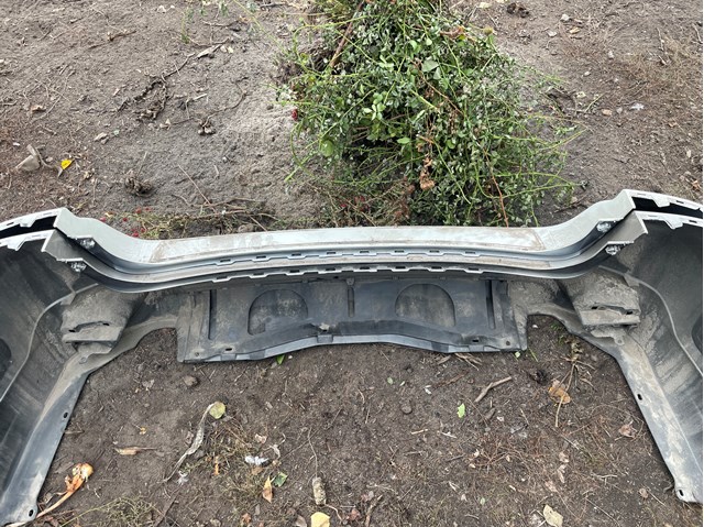 Бампер задній 57704AL130 SUBARU