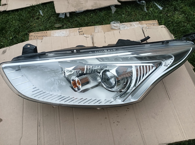 Основна фара в зборі ліва AV1113W030CD FORD