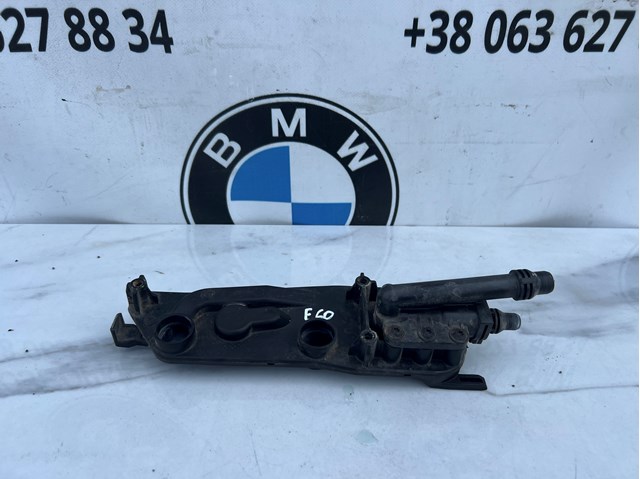 Кронштейн радіатора лівий 17117507973 BMW