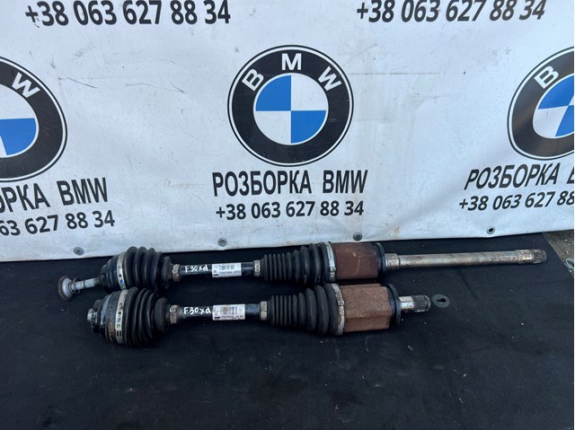 Привід передній правий 31607597694 BMW