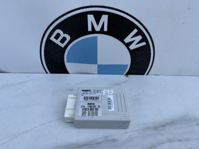 Блок керування пневмопідвіскою 37146860387 BMW