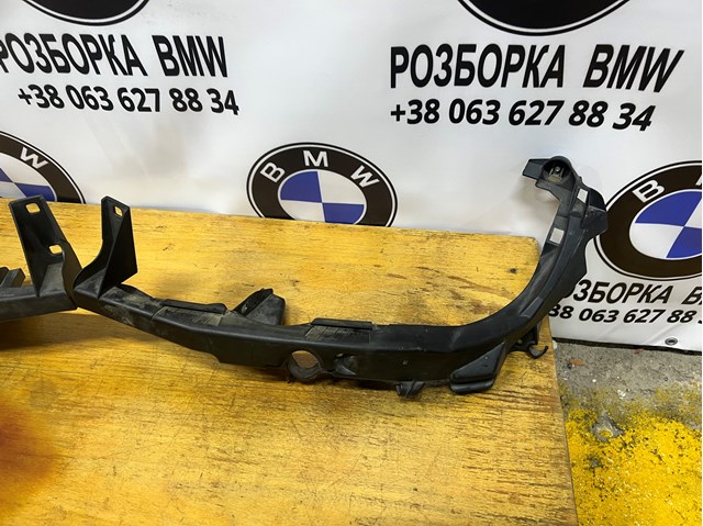 Кріплення фари передньої, лівої 51647116707 BMW