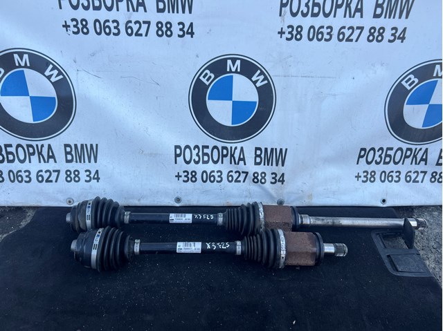 Привід передній правий 7598028 BMW