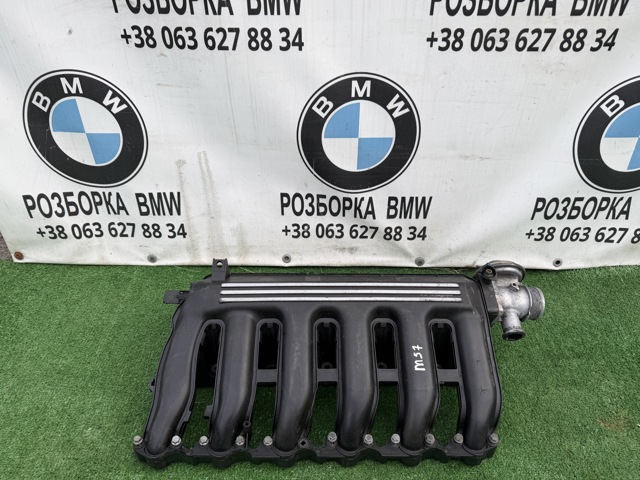 Колектор впускний 7792019 BMW