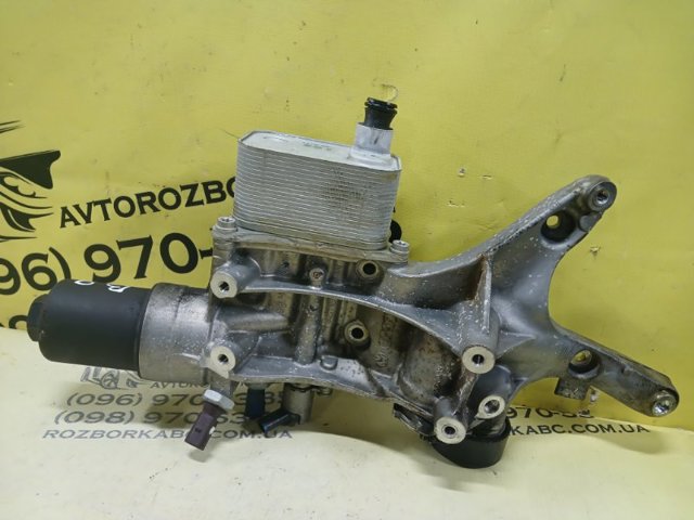 Радіатор масляний (холодильник), під фільтром 06K117021K VAG
