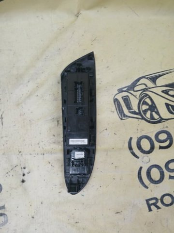 Кнопки переднього лівого склопід'ємника 254015AA0A NISSAN