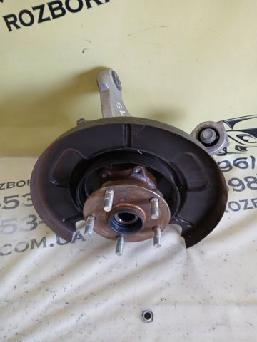 Кулак поворотний правий 28411AN00A SUBARU