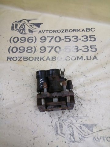 Задній гальмівний супорт лівий 34206883033 BMW