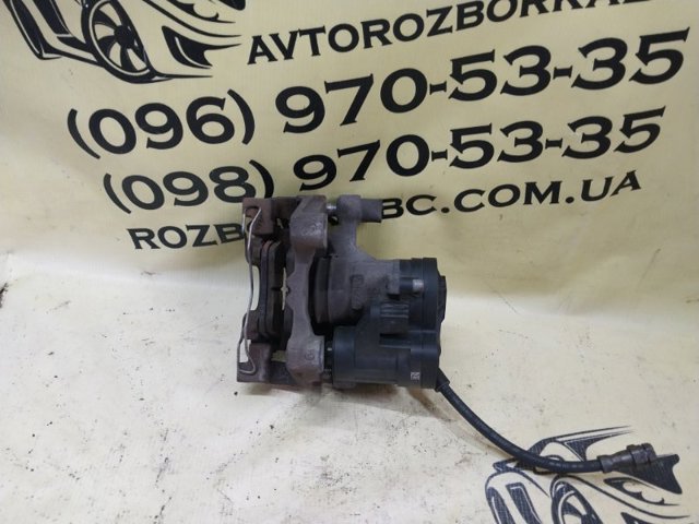 Супорт гальмівний задній правий 3Q0615424 VAG
