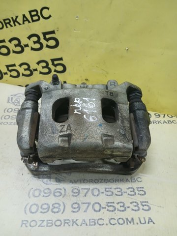 Супорт гальмівний, передній, правий 410013JA0C NISSAN