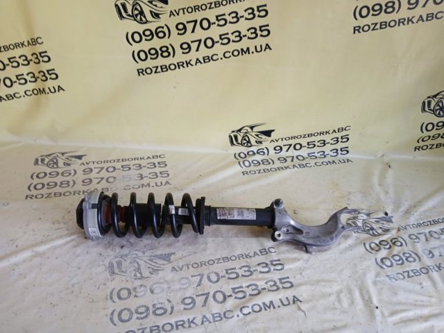 Стойка амортизатора передняя 4M6413029D VAG