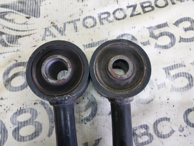 Тяга поздовжня задньої підвіски 551103JA0A NISSAN