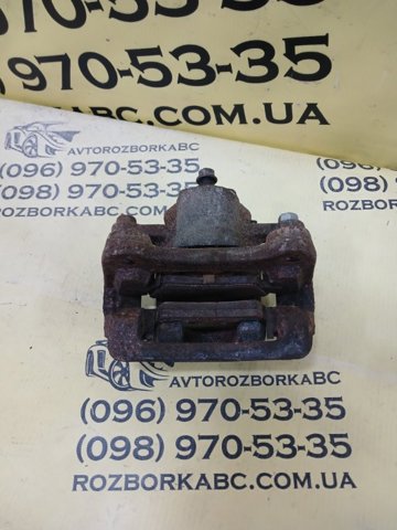 Задній гальмівний супорт лівий 582103Q100 HYUNDAI