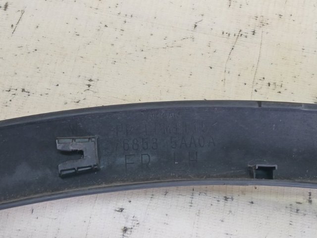 Накладка передньої лівої арки колеса 768535AA0A NISSAN