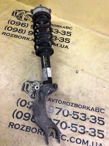 Стойка амортизатора передняя 80A413031AK VAG