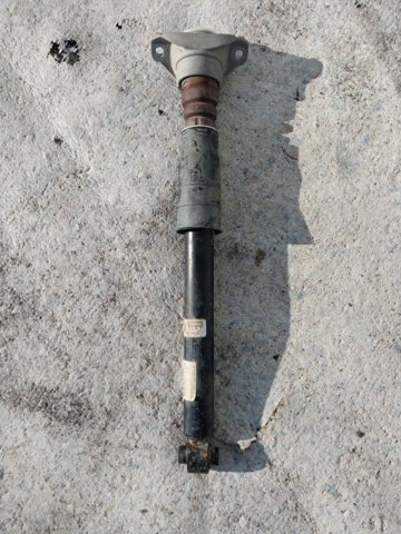 Амортизатор задній 80A513035L VAG