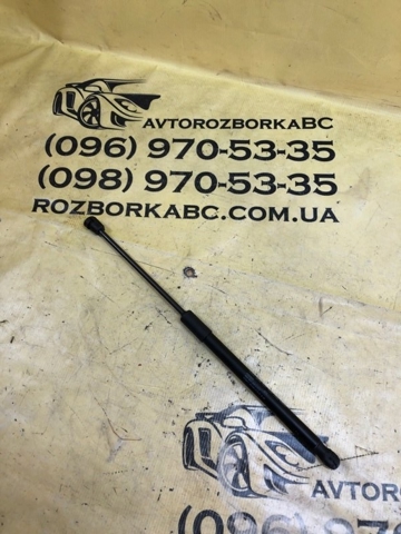 Амортизатор під капот 80A823359C VAG