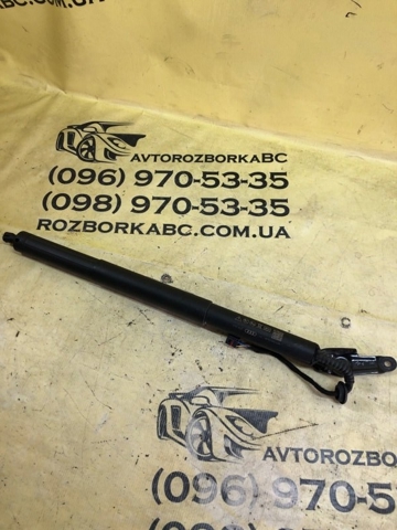 Амортизатор багажника лівий 80A827851C VAG