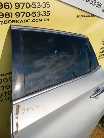 Двері пасажирськи задні ліві 821015AA0A NISSAN