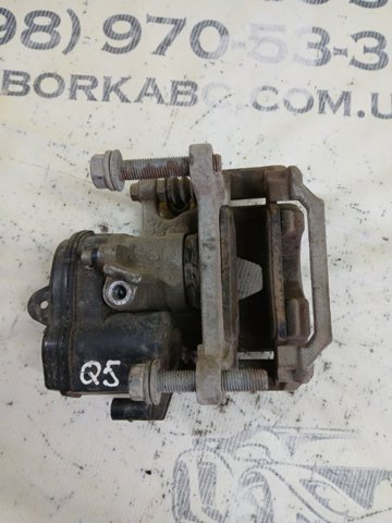 Задній гальмівний супорт лівий 8W0615403A VAG