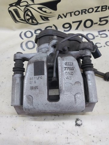 Задній гальмівний супорт лівий 95B615423D VAG