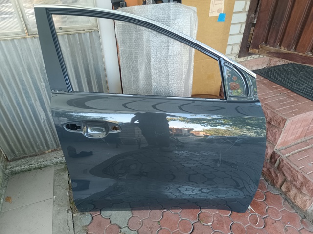Пасажирські передні двері 76004F1000 HYUNDAI