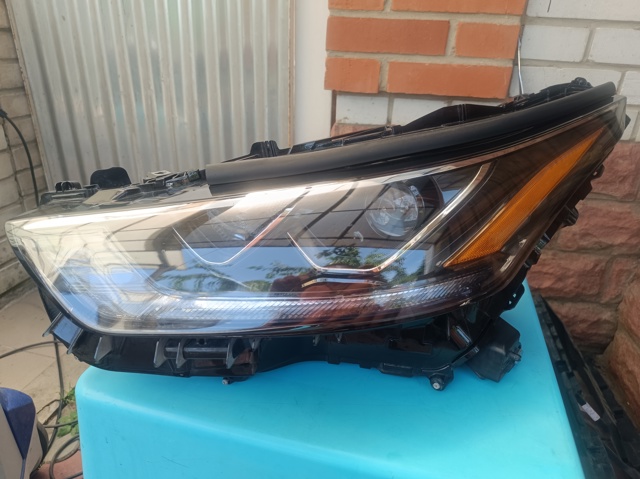 Блок фара ліва 811500E521 TOYOTA