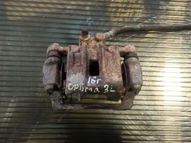 Задній гальмівний супорт лівий 58210C1150 HYUNDAI