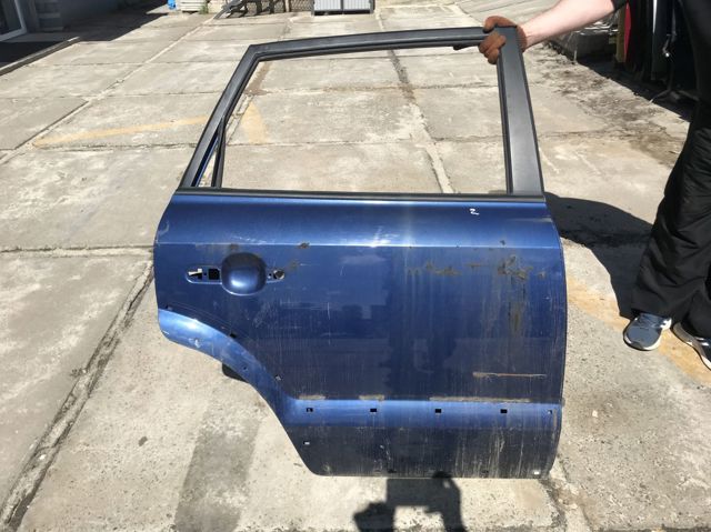 Двері задні в зборі 770042E050 HYUNDAI