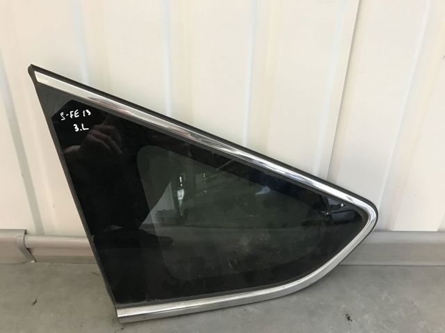 Скло багажного відсіку, ліве 878102W010 HYUNDAI