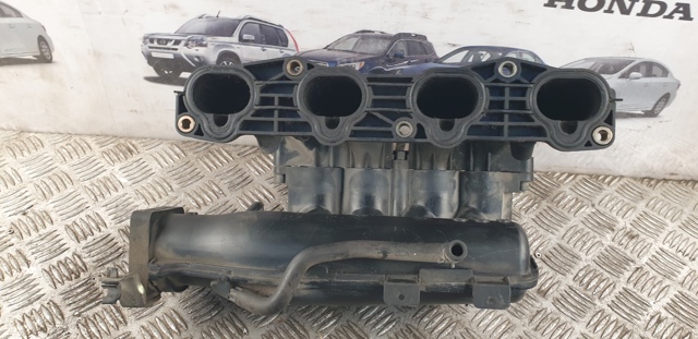 Колектор впускний 14001WE000 NISSAN