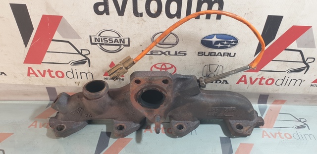 Колектор випускний 1400300Q1T NISSAN