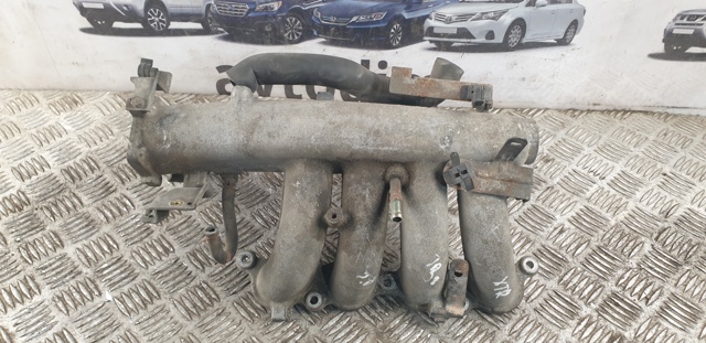 Колектор впускний верхній 140108H310 NISSAN
