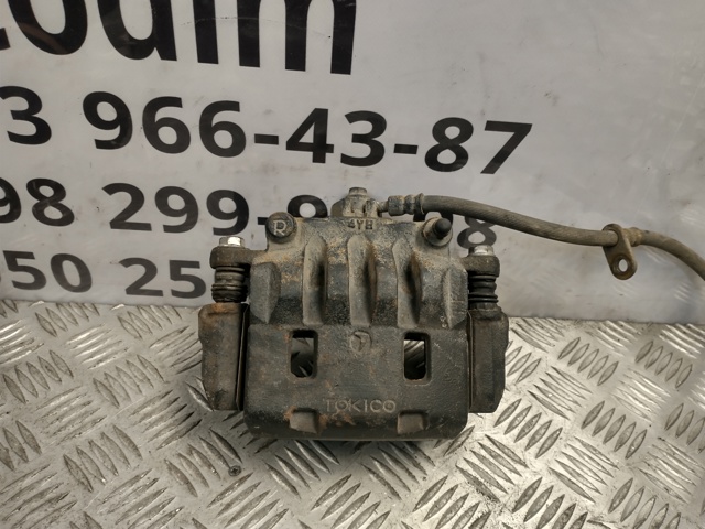 Супорт гальмівний, передній, правий 26292FE000 SUBARU