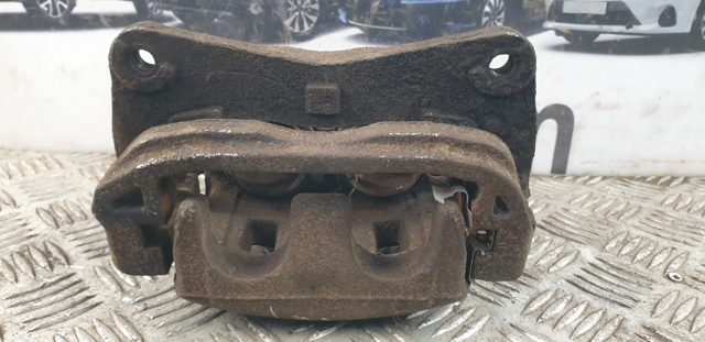 Супорт гальмівний, передній, лівий 26292SC030 SUBARU