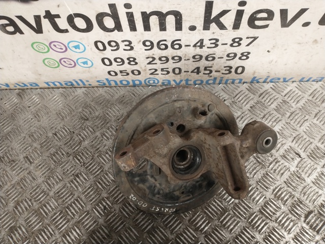Кулак поворотний лівий 28411FE010 SUBARU