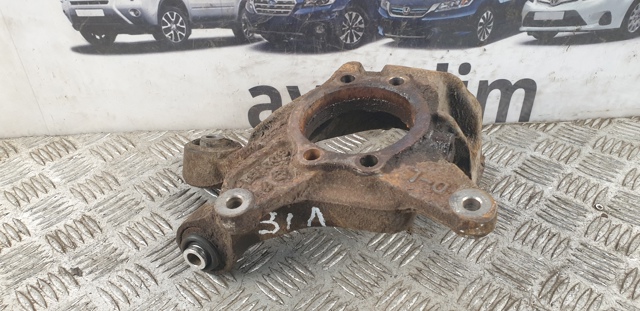 Кулак поворотний лівий 28411SG010 SUBARU
