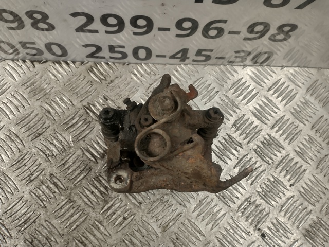 Супорт гальмівний задній правий 43018SMGE02 HONDA