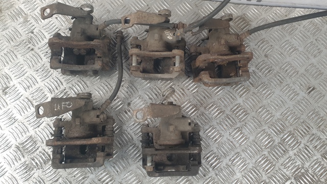 Задній гальмівний супорт лівий 43019SMGE02 HONDA