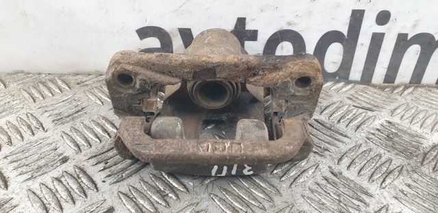 Супорт гальмівний задній правий 440018H300 NISSAN