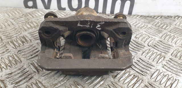 Супорт гальмівний задній правий 44001EB30A NISSAN