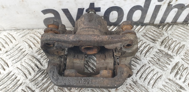 Супорт гальмівний задній правий 44001JG00A NISSAN