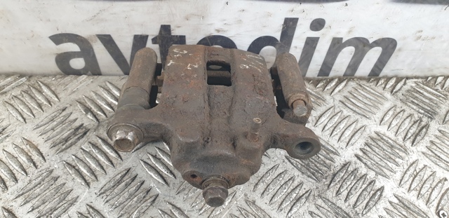 Задній гальмівний супорт лівий 440118H300 NISSAN