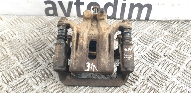 Задній гальмівний супорт лівий 44011EB30A NISSAN