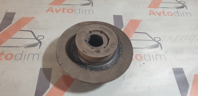 Проставка (гумове кільце) пружини задньої, верхня 55034JD00A NISSAN