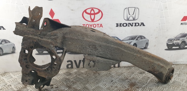 Важіль/тяга задньої підвіски подовжній нижній, лівий 55502JG000 NISSAN