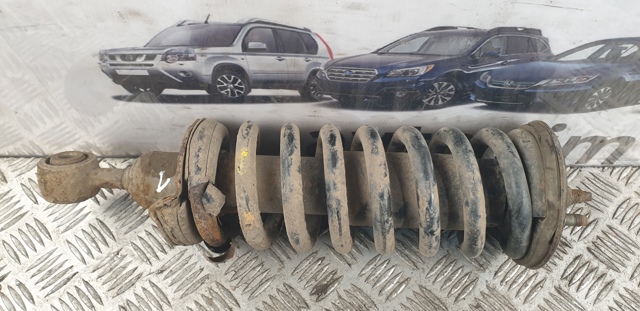 Амортизатор передньої підвіски 56100EB39C NISSAN